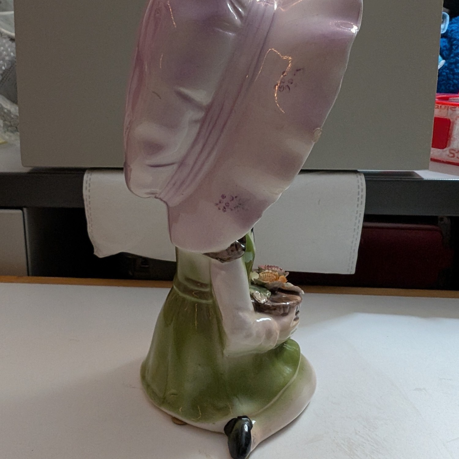 Vintage porcelain figurine - girl with flowers
