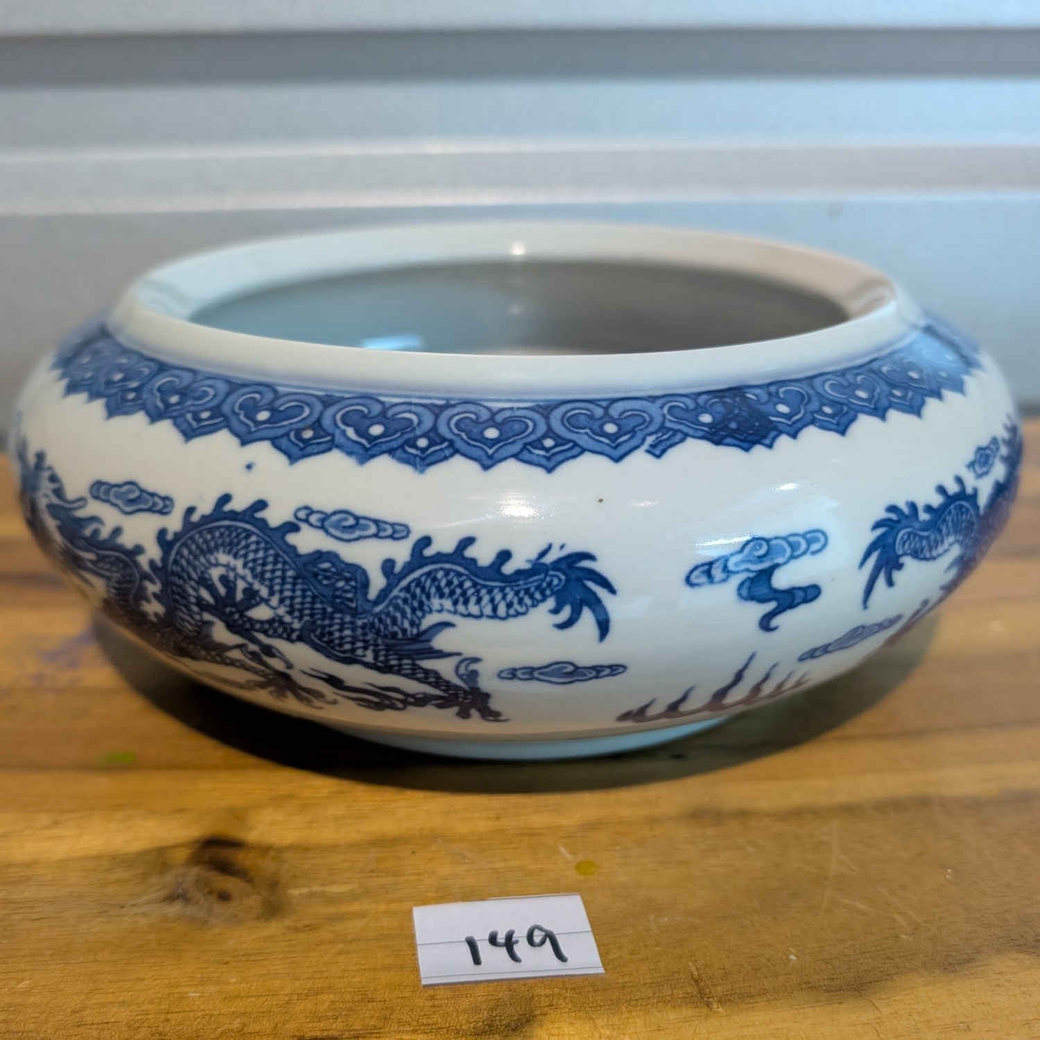 Antique Chinese porcelain bowl - blue and white with dragon motif