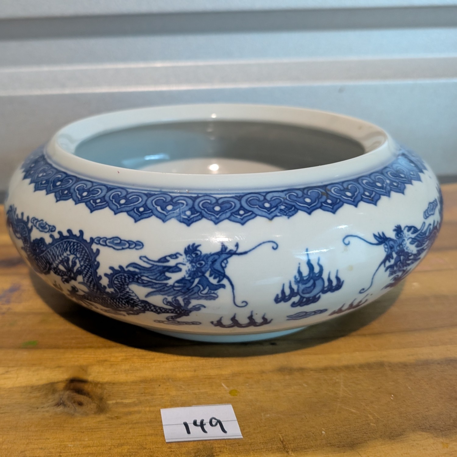 Antique Chinese porcelain bowl - blue and white with dragon motif