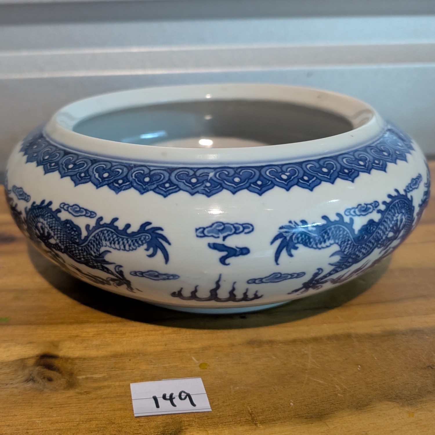 Antique Chinese porcelain bowl - blue and white with dragon motif
