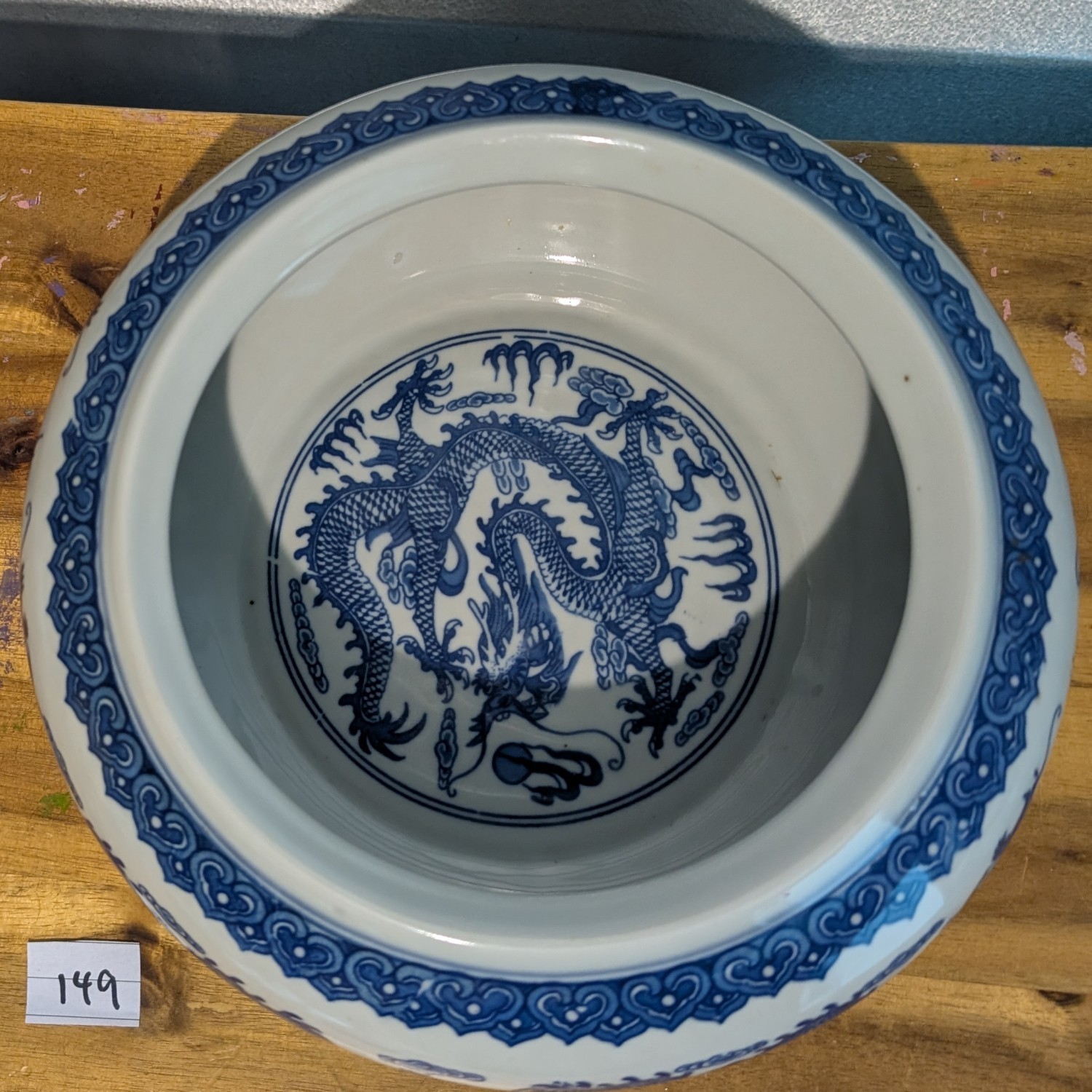 Antique Chinese porcelain bowl - blue and white with dragon motif
