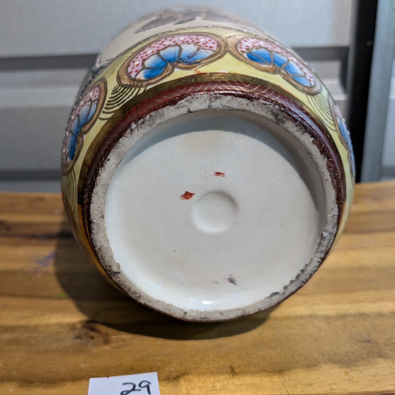 Vintage Japanese Satsuma vase ornate with samurai scene and flowers