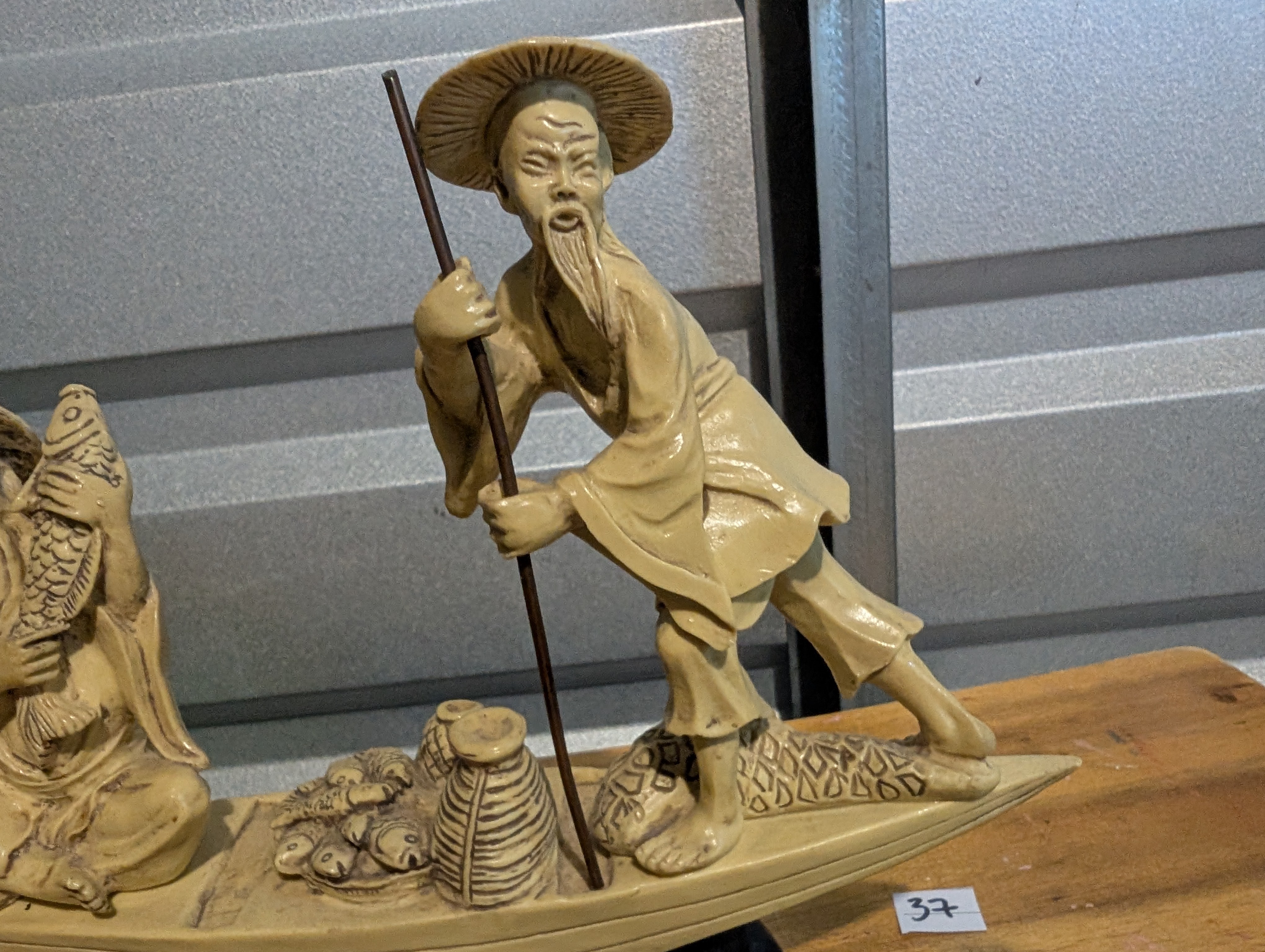 Chinese Men Fishing from a Boat Ivory-look Resin