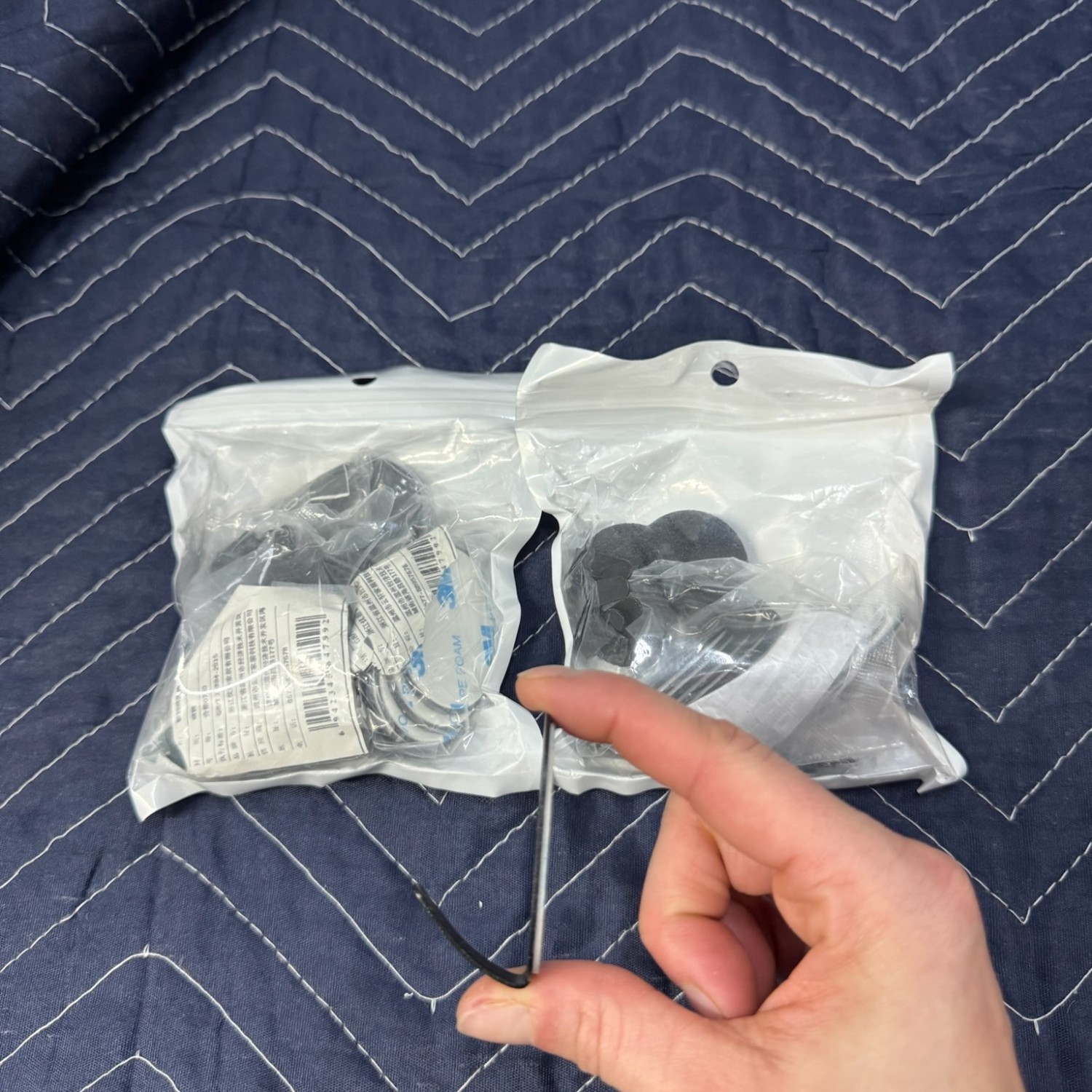 Various black metal sturdy hooks with adhesive or screws