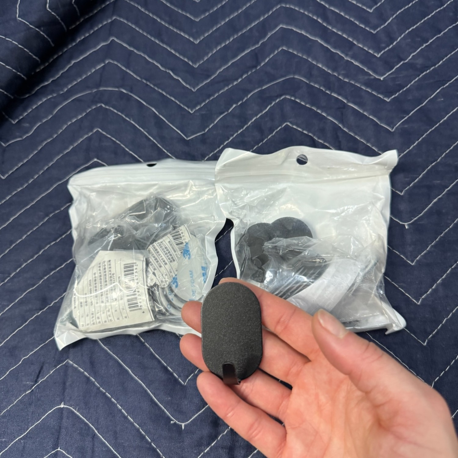 Various black metal sturdy hooks with adhesive or screws