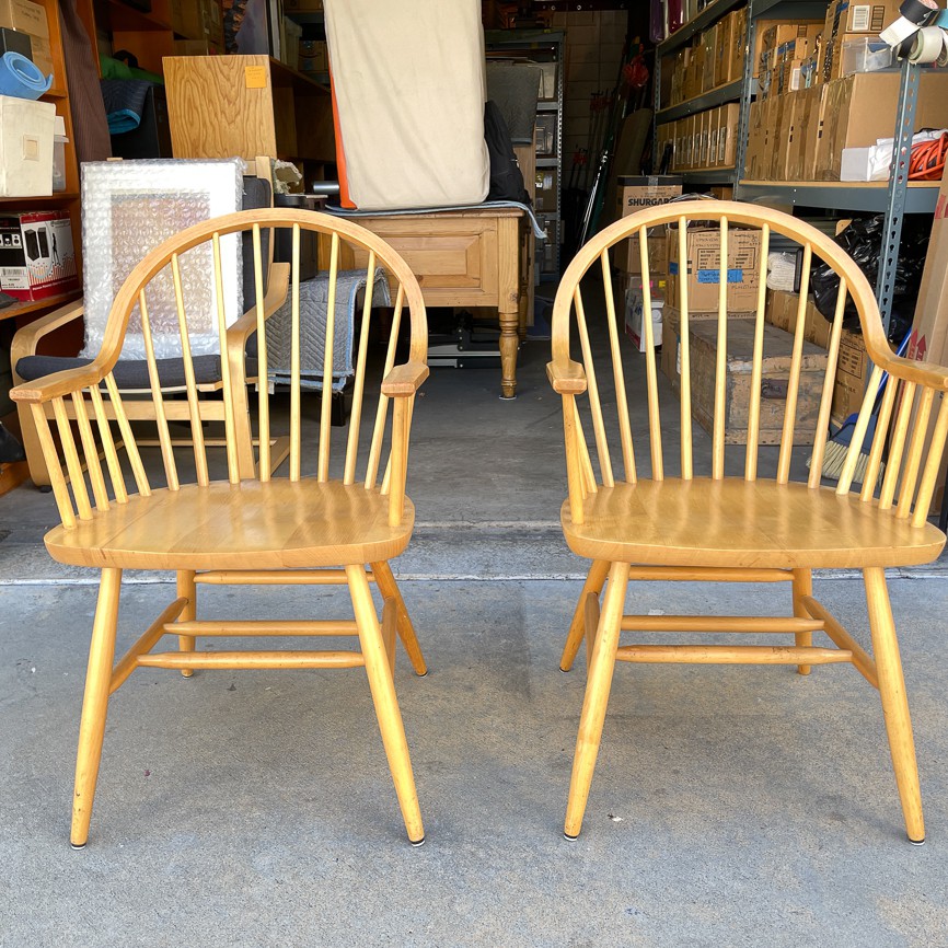 Two bentwood captain’s chairs