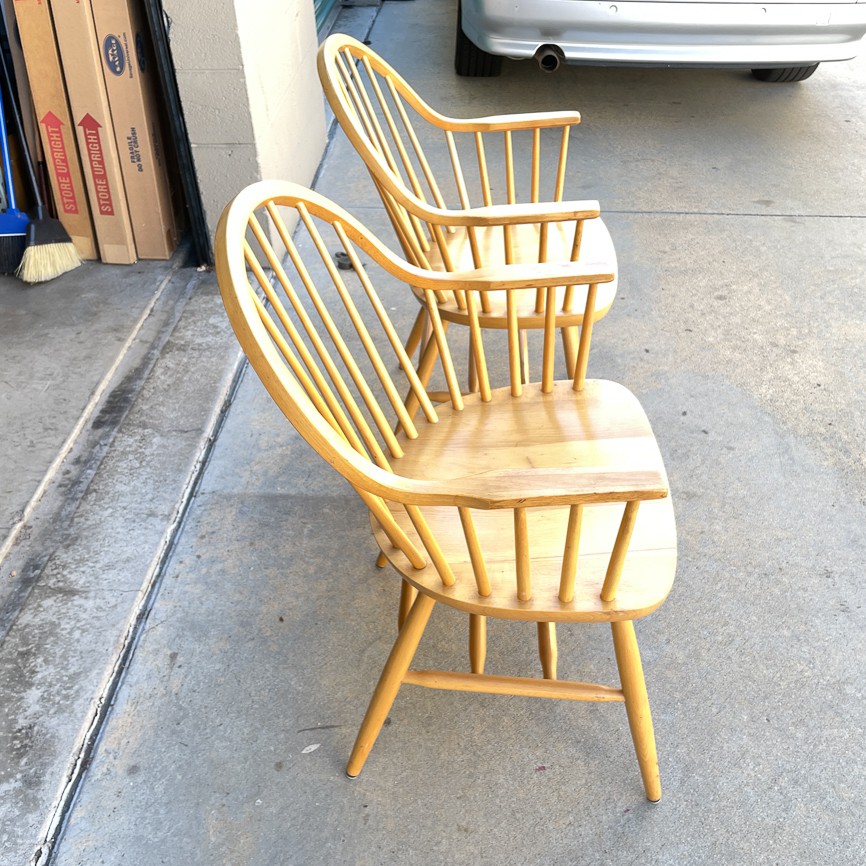 Two bentwood captain’s chairs