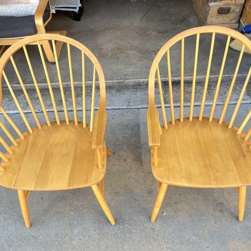 Two bentwood captain’s chairs