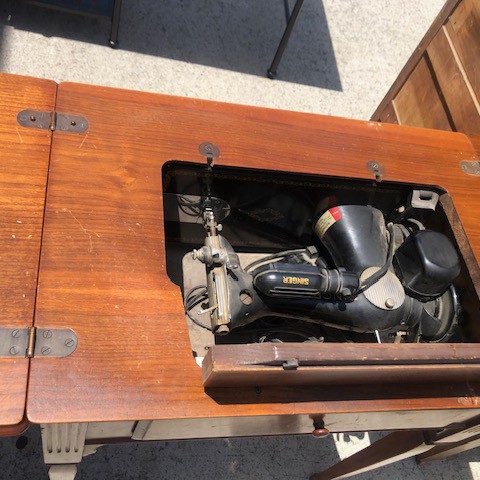 Vintage Singer Sewing Machine in cabinet