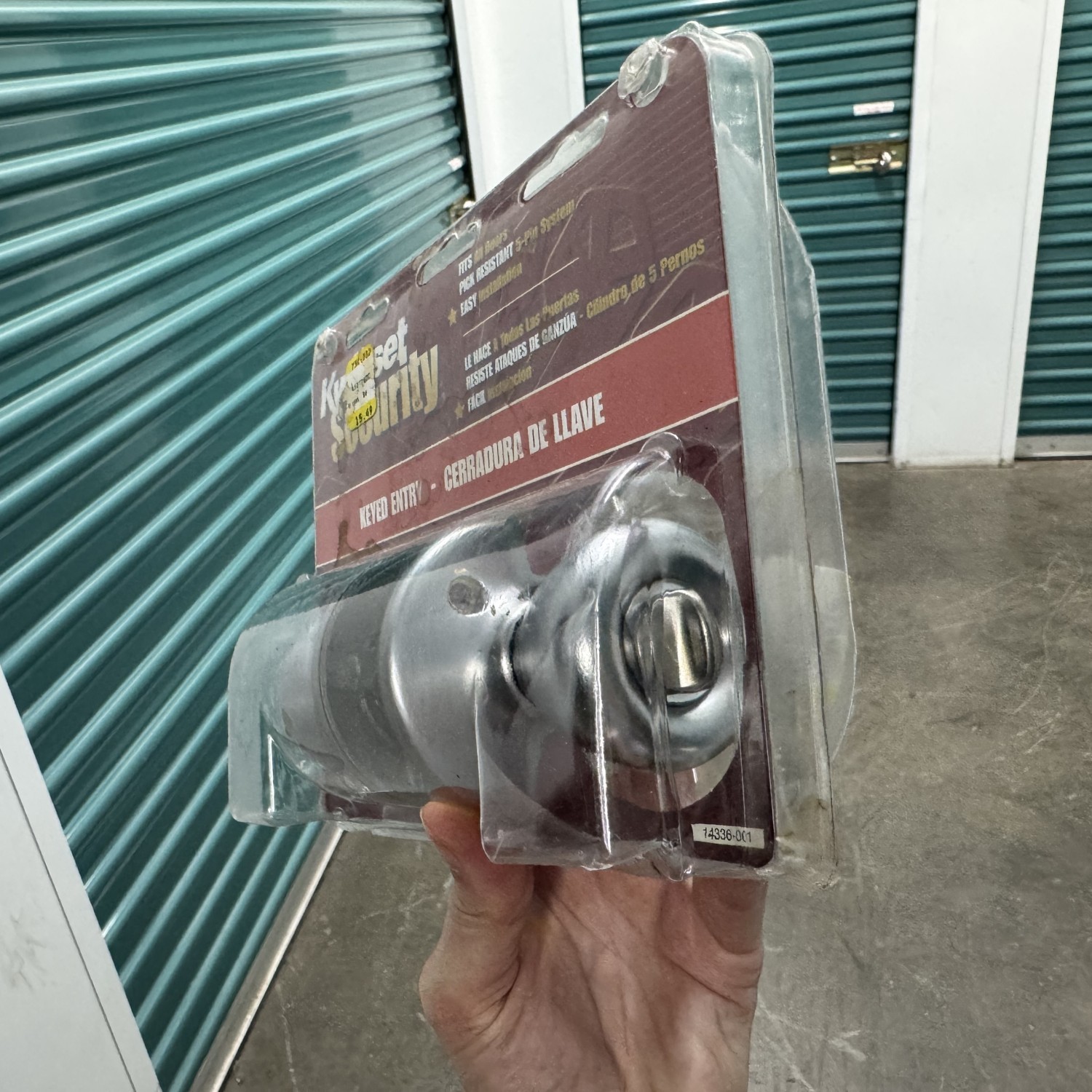 Brand New locking door knob - silver Kwikset
