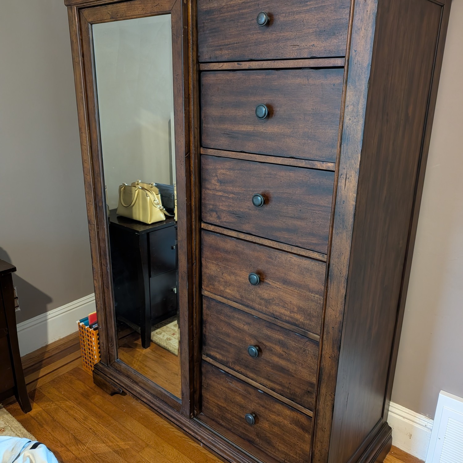 Tall dresser with drawers and shelves